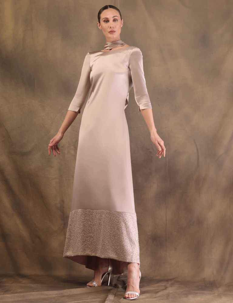 Champagne Fely Campo gown with three-quarter sleeves and embellished hem detail