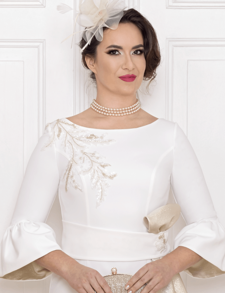 Elegant white dress by Anoola designed for formal occasions