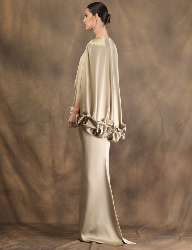 Gold Fely Campo satin dresses with voluminous ruffle details at the sleeves and hems